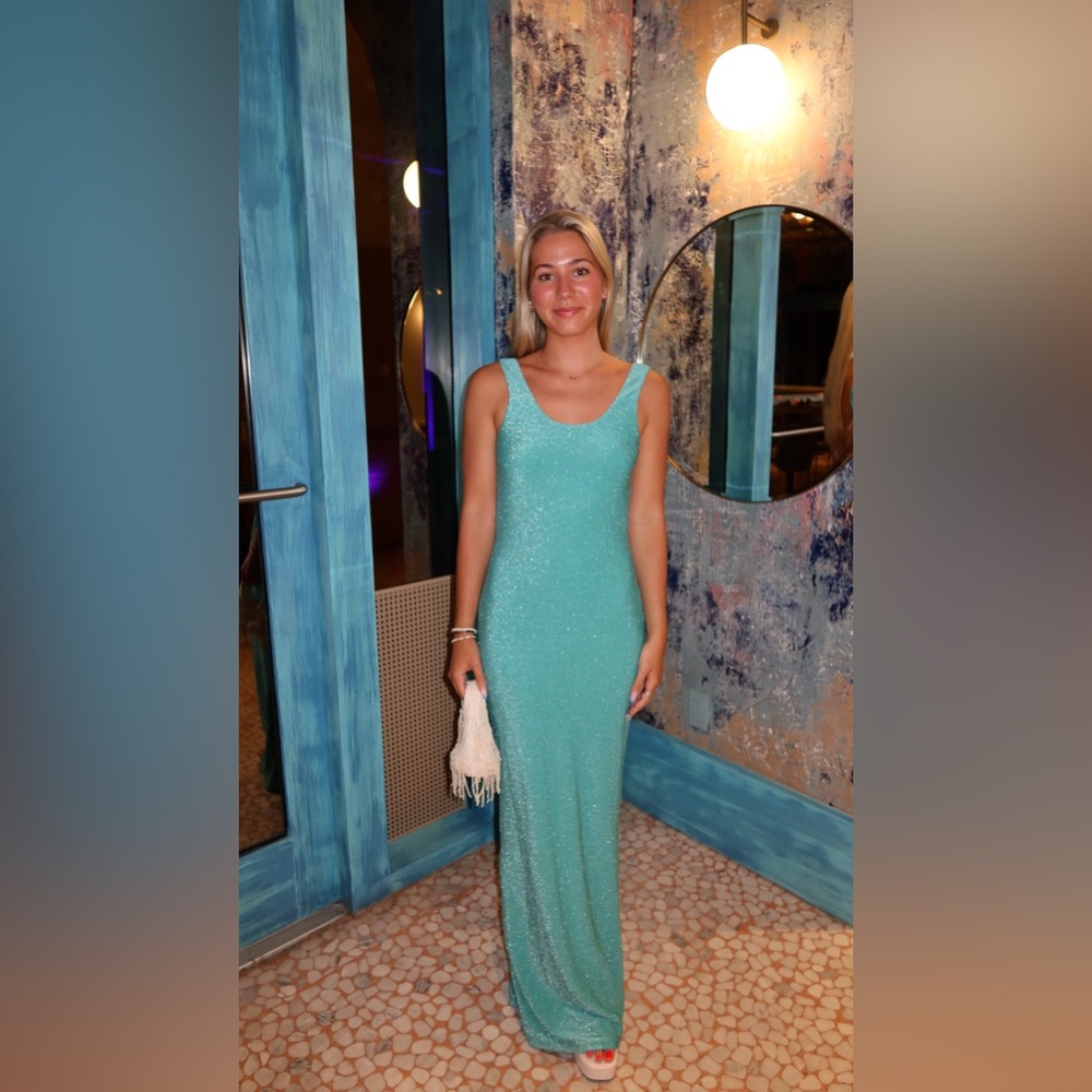 Teal glitter maxi dress with an open back